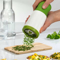 Compact manual garlic, ginger and herb chopper