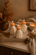 Handmade soy wax ghost candle with pumpkin hat