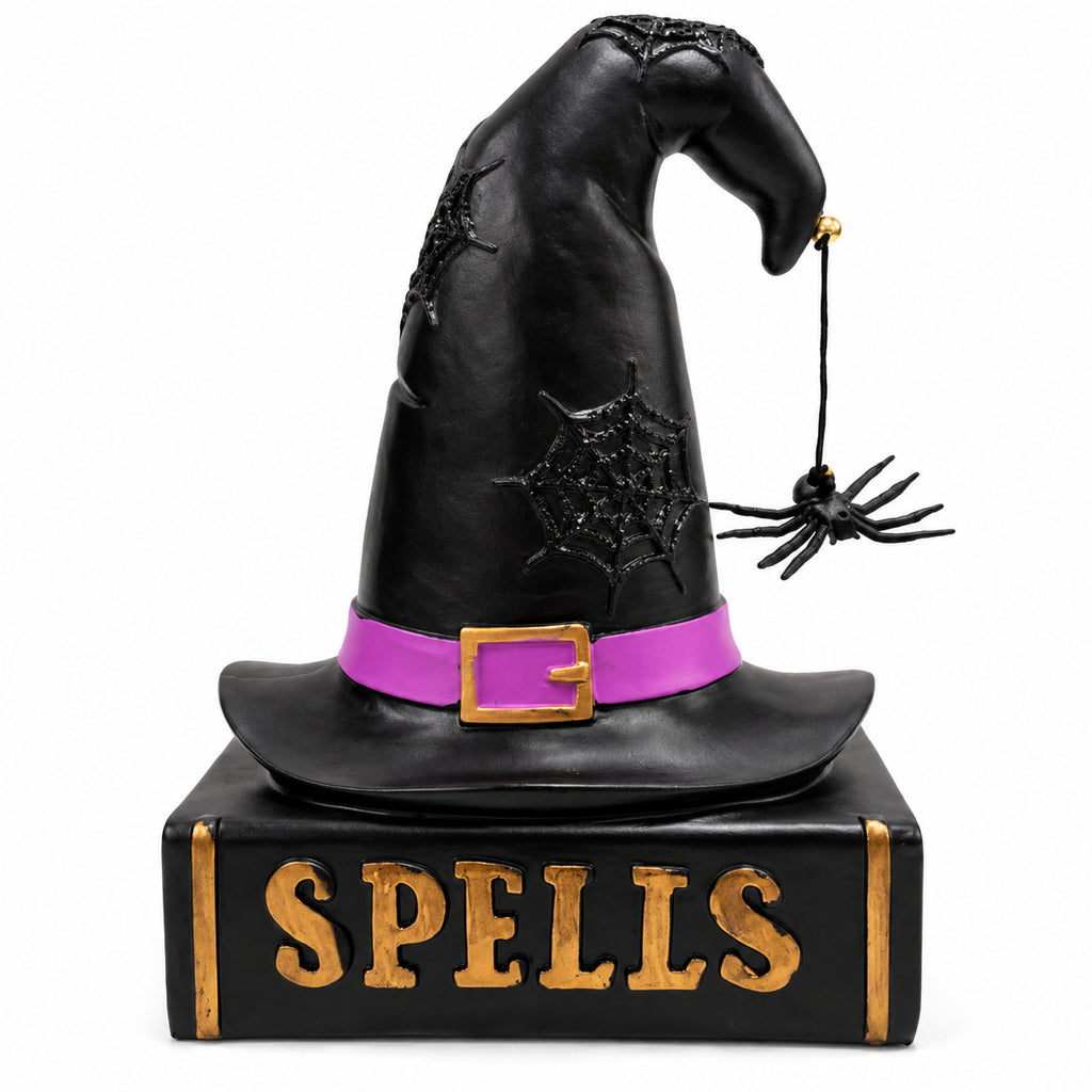 Halloween witch hat and spell book resin figurine